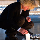 23 July: Marius lighting a candle in Oslo Cathedral (Photo: Vegard Grøtt / Scanpix)